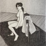 Nude seated facing left with robe on chair on shag rug 1982